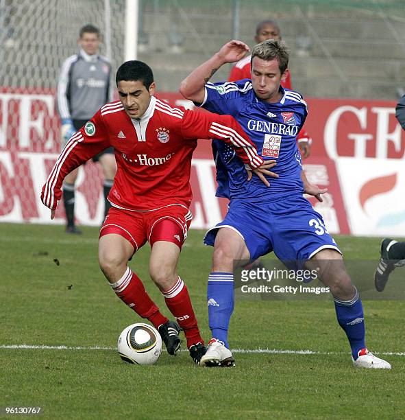 Mehmet Ekici of Bayern Muenchen II and Manuel Konrad of Unterhaching battle for the ball during the 3.Liga match between SpVgg Unterhaching and...