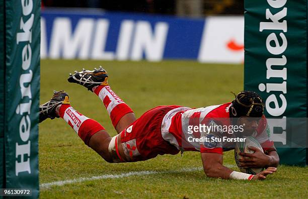 Gloucester forward Akapusi Qera dives over to score the first Gloucester try during the Heineken Cup Pool 2, Round 6 match between Newport Gwent...