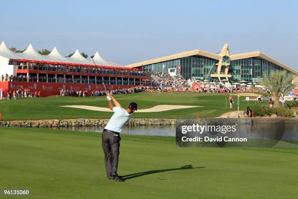 Martin Kaymer of Germany plays his second shot to the par 5, 18th hole during the final round of The Abu Dhabi Golf Championship at Abu Dhabi Golf...