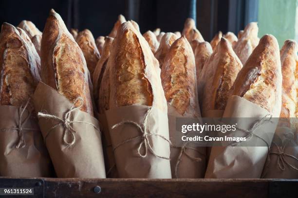 fresh bread loafs displayed at bakery - bread packet stock pictures, royalty-free photos & images