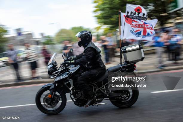 Bikers ride past the site of the murder of Fusilier Lee Rigby to mark the fifth anniversary of his death on May 22, 2018 in London, England....