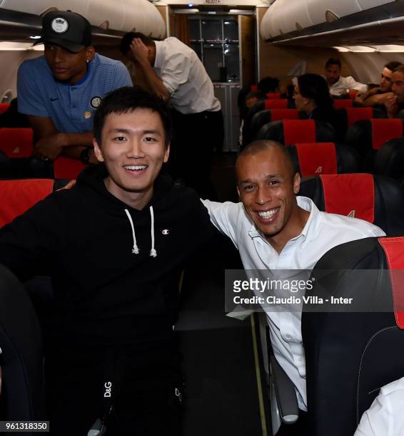 Internazionale Milano board member Steven Zhang Kangyang and Joao Miranda de Souza Filho of FC Internazionale celebrate on the plane after the serie...
