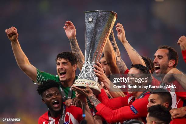 Players of Atletico Madrid lift the UEFA Europa League trophy during the UEFA Europa League Final between Olympique de Marseille and Club Atletico de...