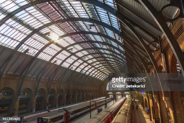 king's cross station, platform 9 3/4 | harry potter - harry potter books stock pictures, royalty-free photos & images