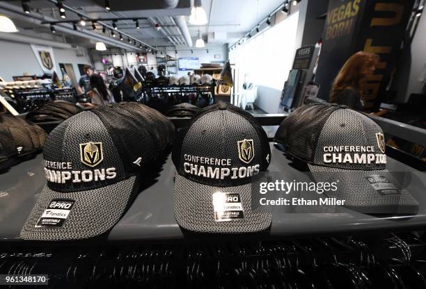 Vegas Golden Knights "Conference Champions" hats are displayed at the Arsenal retail store at City National Arena the day after the team won the...