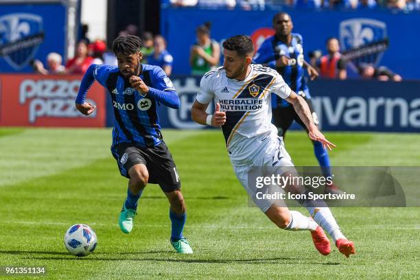 Los Angeles Galaxy defender Emrah Klimenta tries to stop Montreal Impact midfielder Raheem Edwards during the LA Galaxy versus the Montreal Impact...