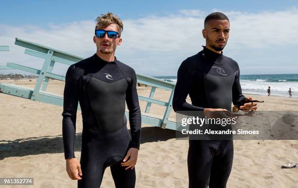 Jeremy Toljan and Maximilian Philipp of Borussia Dortmund are getting a surf lesson at the Venice Beach during Borussia Dortmund's USA Training Camp...