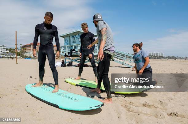 Jeremy Toljan and Maximilian Philipp of Borussia Dortmund are getting a surf lesson at the Venice Beach during Borussia Dortmund's USA Training Camp...