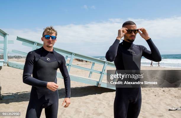 Jeremy Toljan and Maximilian Philipp of Borussia Dortmund are getting a surf lesson at the Venice Beach during Borussia Dortmund's USA Training Camp...