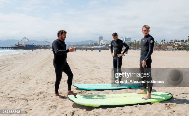 Jeremy Toljan and Maximilian Philipp of Borussia Dortmund are getting a surf lesson at the Venice Beach during Borussia Dortmund's USA Training Camp...