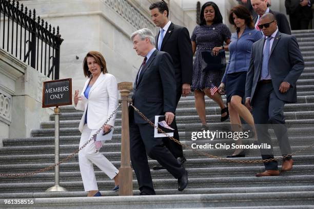 House Minority Leader Nancy Pelosi , Sen. Sheldon Whitehouse , Rep. John Sarbanes , Rep. Pramila Jayapal and Rep. Cheri Bustos walk out of the House...