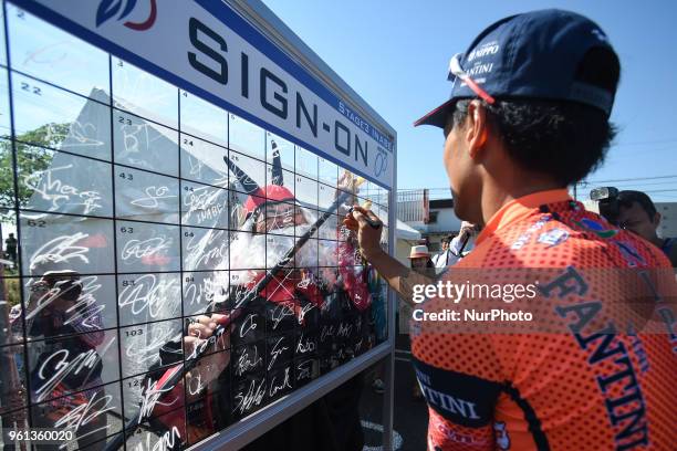Japanese rider Masakazu Ito from Nippo-Vini Fantini Team, signs on ahead of Inabe stage, 127.0km on Inabe circuit race, the third stage of Tour of...