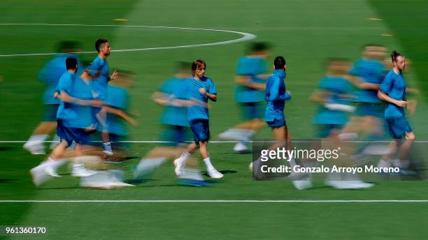 Cristiano Ronaldo of Real Madrid CF warms up with teammates as Luka Modric and Gareth Bale during a training session held during the Real Madrid UEFA...