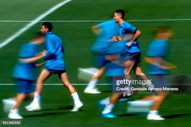 Cristiano Ronaldo of Real Madrid CF warms up with teammates during a training session held during the Real Madrid UEFA Open Media Day ahead of the...