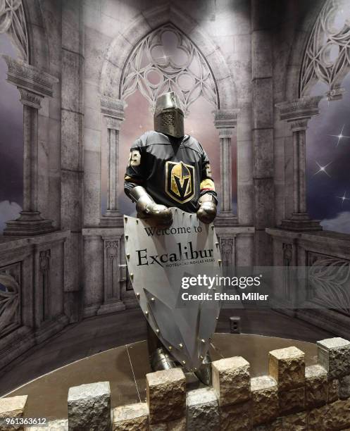 Knight at Excalibur Hotel & Casino wears a jersey of goaltender Marc-Andre Fleury of the Vegas Golden Knights the day after the team won the Western...