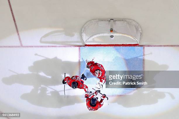 The Washington Capitals celebrate after defeating the Tampa Bay Lightning in Game Six of the Eastern Conference Finals during the 2018 NHL Stanley...