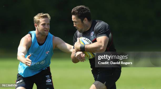 Brad Barritt runs with the ball during the Saracens training session held at Old Albanians on May 22, 2018 in St Albans, England.