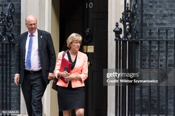 Secretary of State for Transport Chris Grayling and Lord President of the Council and Leader of the House of Commons Andrea Leadsom leave after a...