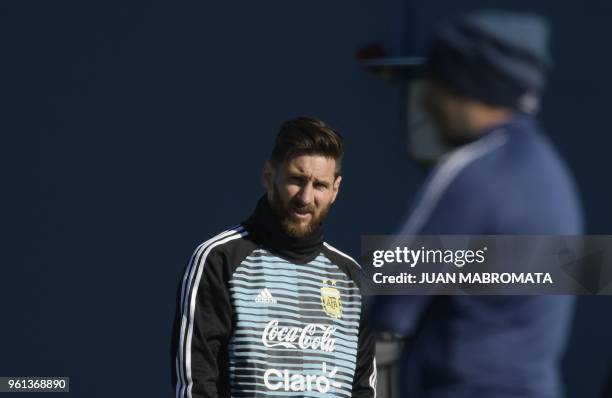 Argentina's football team forward Lionel Messi , gestures next to Argentina's head coach Jorge Sampaoli, during a training session in Ezeiza, Buenos...