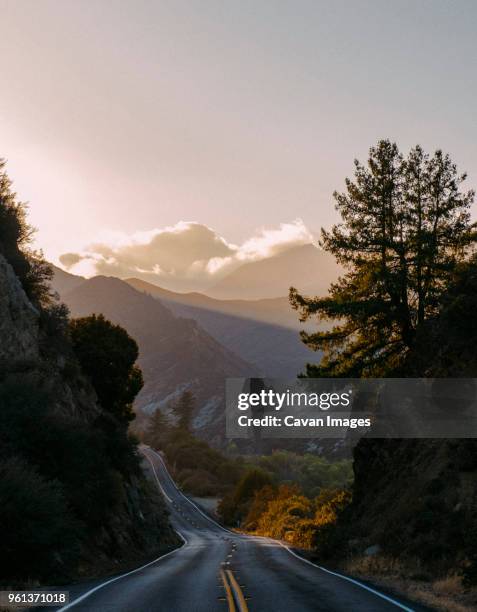 high angle view of country road by mountains against sky - ojai california foto e immagini stock