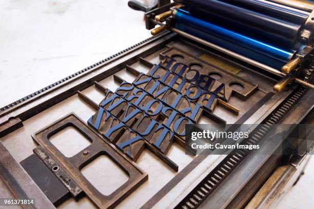 high angle view of wooden alphabets on table - table font view stock pictures, royalty-free photos & images