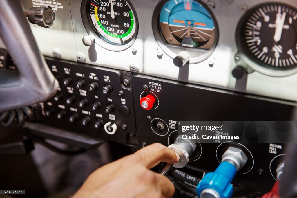 Control Panel Piloting System Cropped Image Of Pilot Operating Control Panel In Airplane High-Res ...