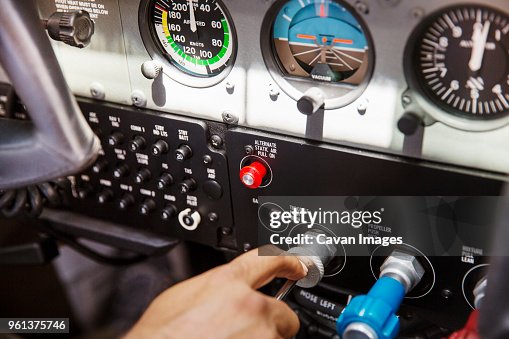 Pilot Operating Button Cropped Image Of Pilot Operating Control Panel In Airplane High-Res ...