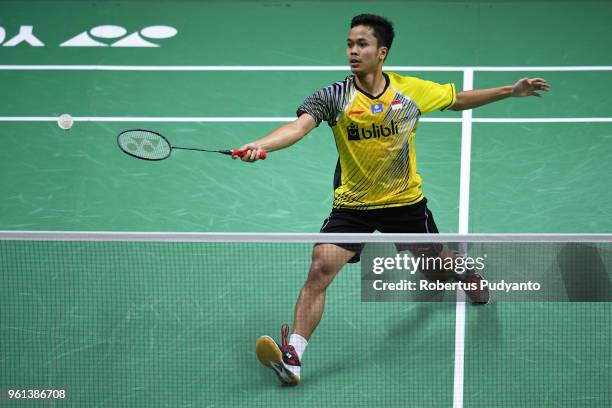 Anthony Sinisuka Ginting of Indonesia competes against Khosit Phetradab of Thailand during Preliminary Round on day three of the BWF Thomas & Uber...