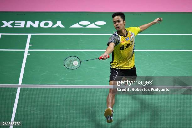 Anthony Sinisuka Ginting of Indonesia competes against Khosit Phetradab of Thailand during Preliminary Round on day three of the BWF Thomas & Uber...