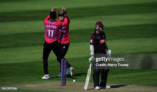 Steve Davies of Somerset is bowled by Abidine Sakande of Sussex as he celebrates with Danny Briggs of Sussex during the Royal London One-Day Cup...
