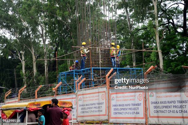 Bangladeshi labor works in Dhaka Mass Rapid Transit Development Project in Dhaka Capital City in Bangladesh, on May 22, 2018