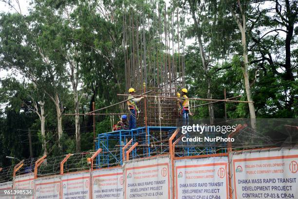 Bangladeshi labor works in Dhaka Mass Rapid Transit Development Project in Dhaka Capital City in Bangladesh, on May 22, 2018