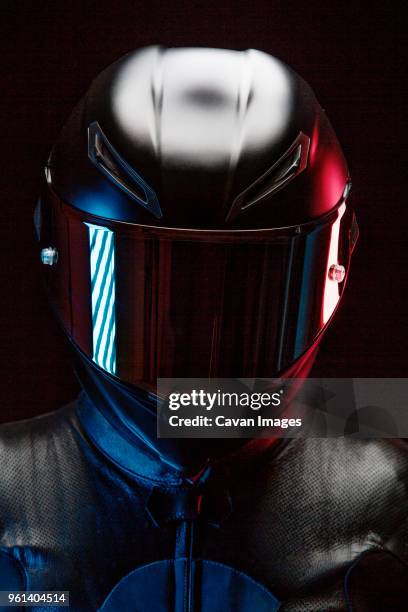 close-up of biker wearing crash helmet - crash helmet fotografías e imágenes de stock