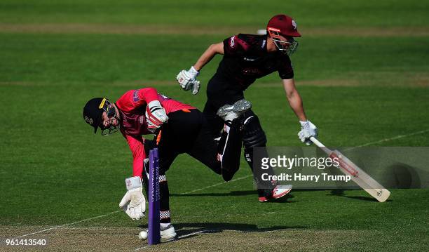 Ben Brown of Sussex attempts to run out James Hidlreth of Somerset during the Royal London One-Day Cup match between Somerset and Sussex at The...