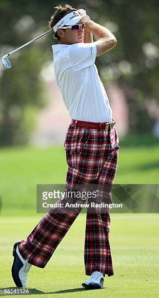 Ian Poulter of England plays his second shot on the fifth hole during the final round of The Abu Dhabi Golf Championship at Abu Dhabi Golf Club on...