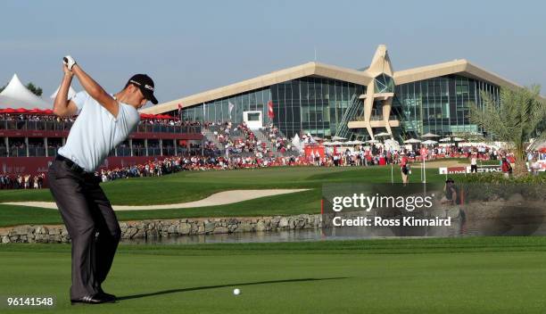 Maritin Kaymer of Germany plays his second shot to the par five 18th hole during the Abu Dhabi Golf Championship at the Abu Dhabi Golf Club on...