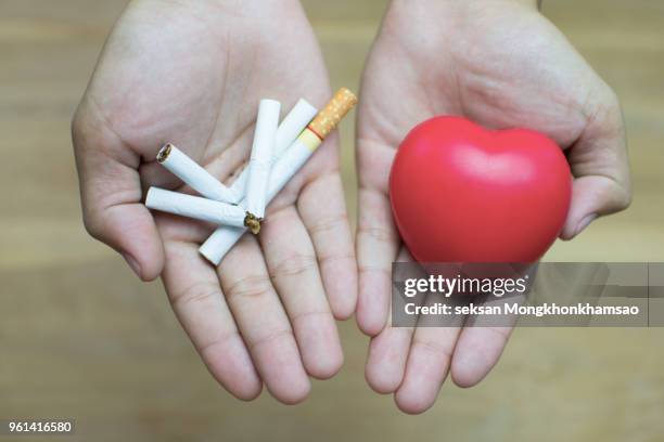 quit smoking keeps your heart healthy. - quit bad habit stock pictures, royalty-free photos & images