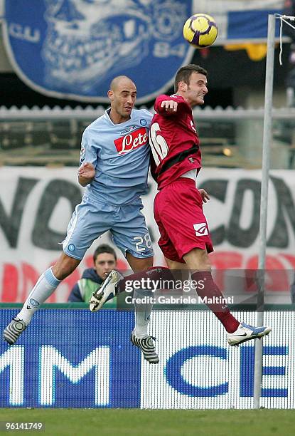 Andrea Esposito of AS Livorno in action against Paolo Cannavaro of SSC Napoli during the Serie A match between Livorno and Napoli at Stadio Armando...