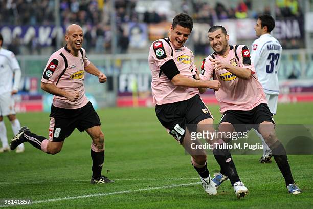 Igor Budan of Palermo celebrates his goal with his team mates Giulio Migliaccio and Cesare Bovo during the Serie A match between Palermo and...