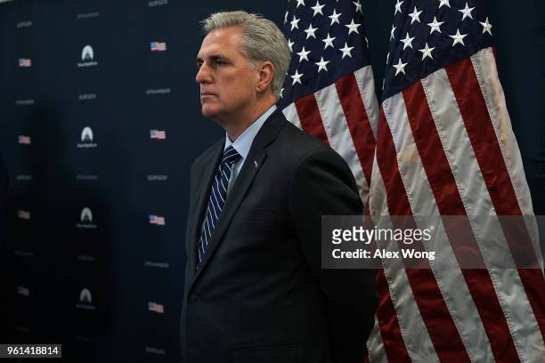 House Majority Leader Rep. Kevin McCarthy listens during a news briefing after a House Republican Conference meeting May 22, 2018 on Capitol Hill in...