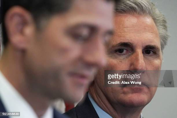 Speaker of the House Rep. Paul Ryan speaks as House Majority Leader Rep. Kevin McCarthy listens during a news briefing after a House Republican...