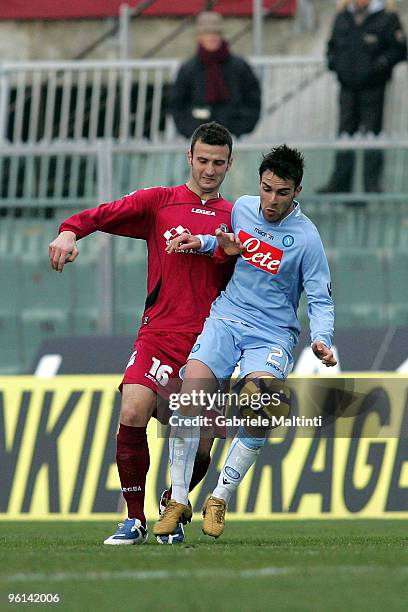 Andrea Esposito of AS Livorno in action against Luca Cigarini of SSC Napoli during the Serie A match between Livorno and Napoli at Stadio Armando...