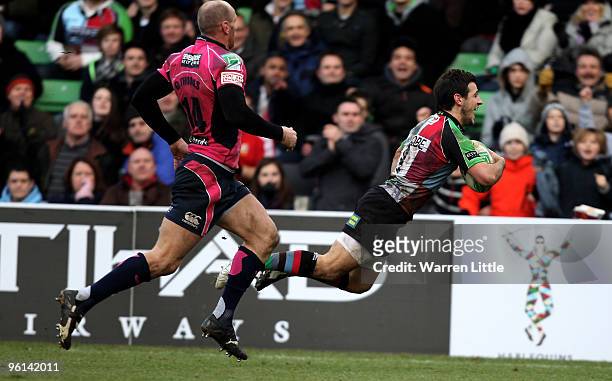 Danny Care of Harlequins dives over to score a try during the Heineken Cup round six match between Harlequins and Cardiff Blues at The Stoop on...