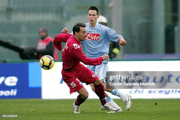 Antonio Filippini of AS Livorno in action against Marek Hamsik of SSC Napoli during the Serie A match between Livorno and Napoli at Stadio Armando...