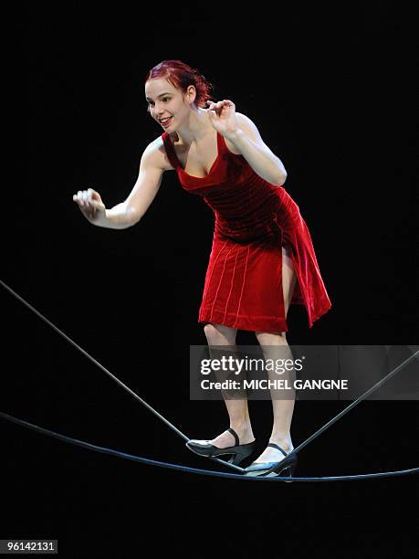 German Sarah Tragner performs as a tiretrope walker on January 24, 2010 in Marseille, southern France during a show of the Archaos French...