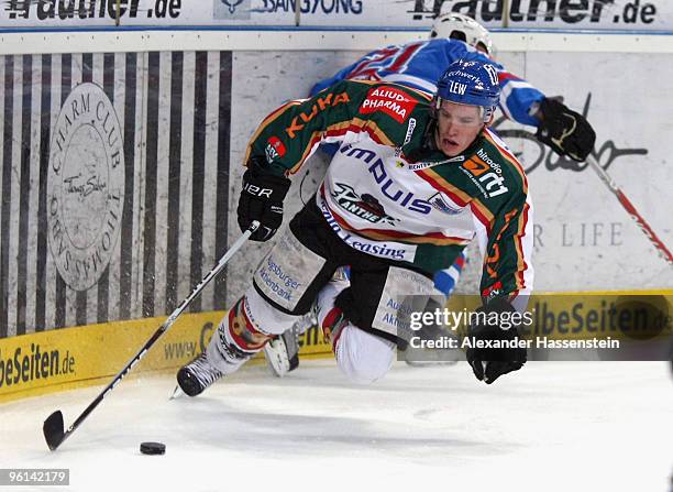 Florian Kettemer of Augsburg in action with Morten Ask of Nuremberg during the DEL metch between Thomas Sabo Ice Tigers and Augsburger Panther at the...