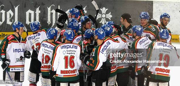 Players of Augsburg celebrate winning the match after penalty shoot out of the DEL match between Thomas Sabo Ice Tigers and Augsburger Panther at the...