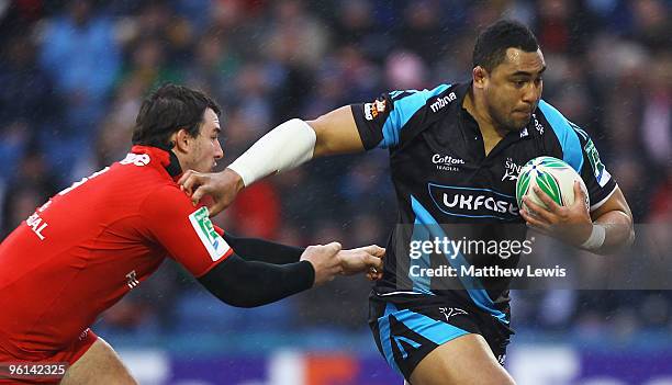 Sisa Koyamaibole of Sale hands off Louis Picamoles of Toulouse during the Heineken Cup match between Sale Sharks and Toulouse at Edgeley Park on...