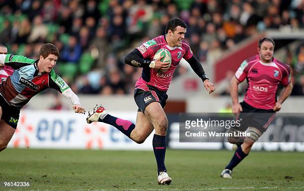 Jamie Roberts of Harlequins races through to score a try during the Heineken Cup round six match between Harlequins and Cardiff Blues at The Stoop on...