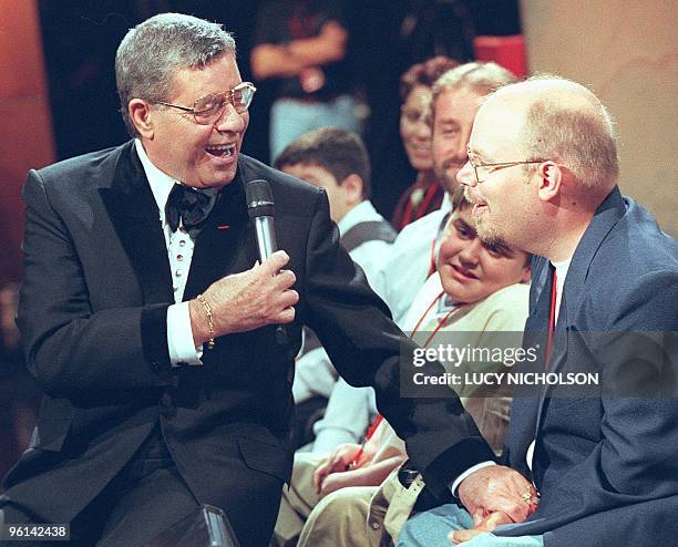 Comedian Jerry Lewis introduces himself to the studio audience at the start of the 34th annual Jerry Lewis Telethon to benefit the Muscular Dystrophy...